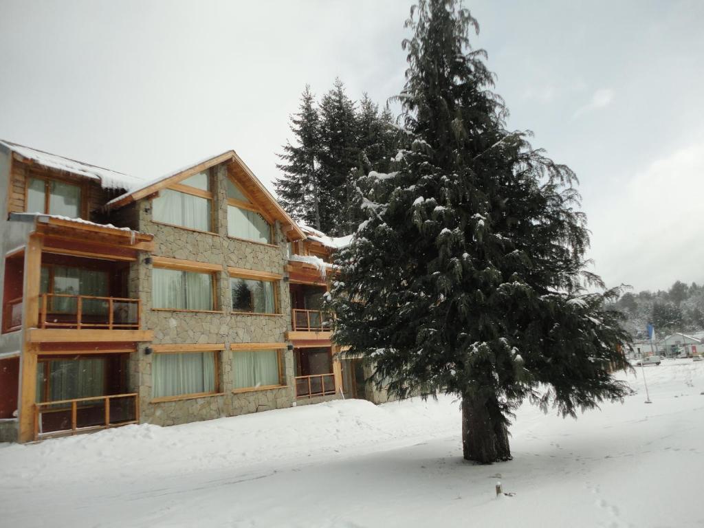 Unquehue Apartamentos Dormis Villa La Angostura Bagian luar foto