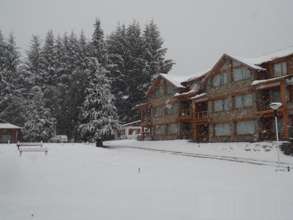 Unquehue Apartamentos Dormis Villa La Angostura Bagian luar foto